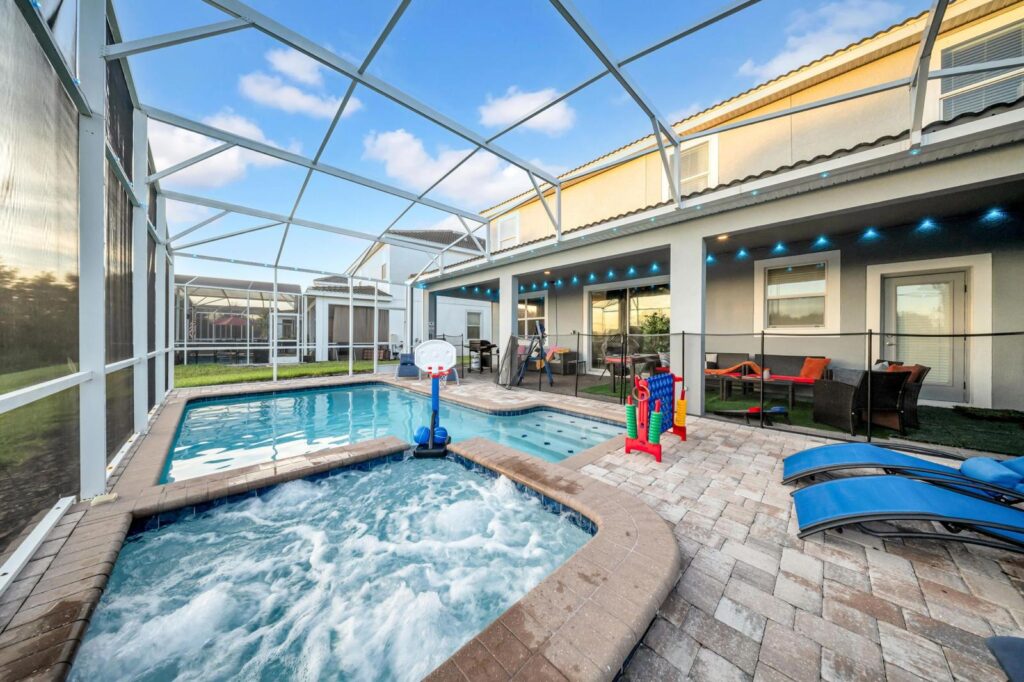 Private poolside retreat with shaded lounge area in Florida vacation rental