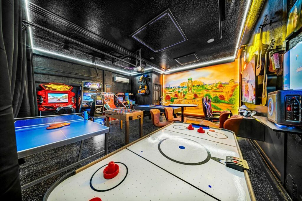 well equipped gaming room with air hockey and other games to keep you entertained